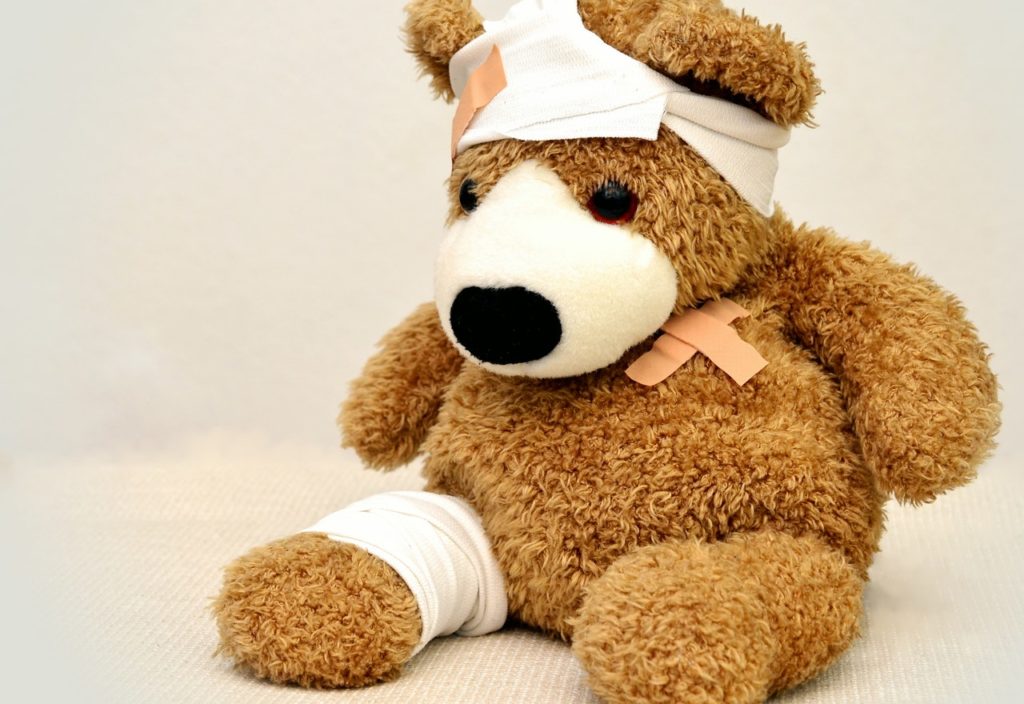 Brown and white bear plush toy