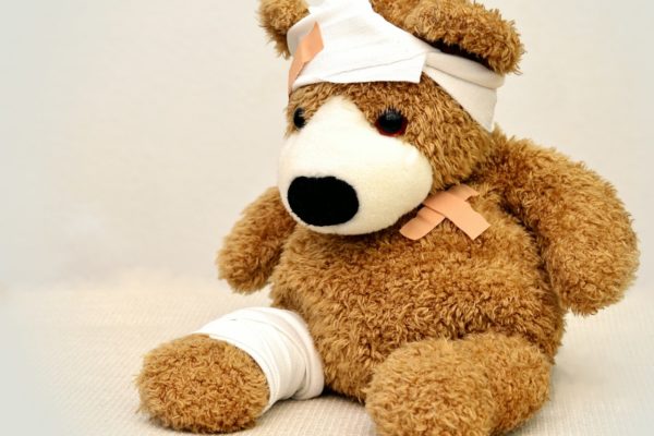Brown and white bear plush toy