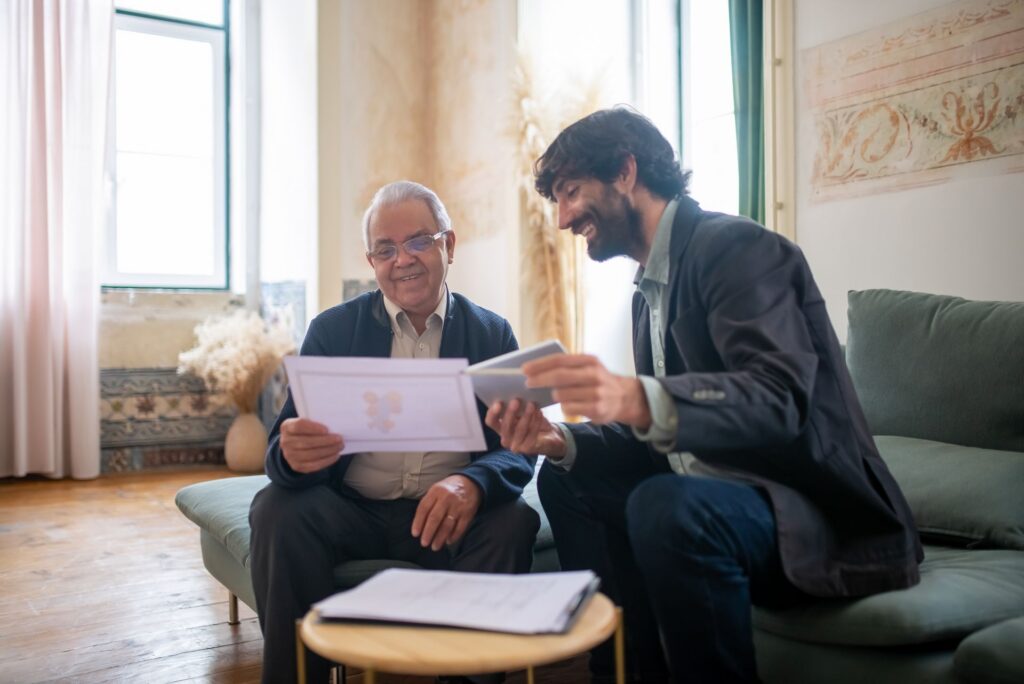 Business owner reviewing financial documents with an accountant in an office meeting